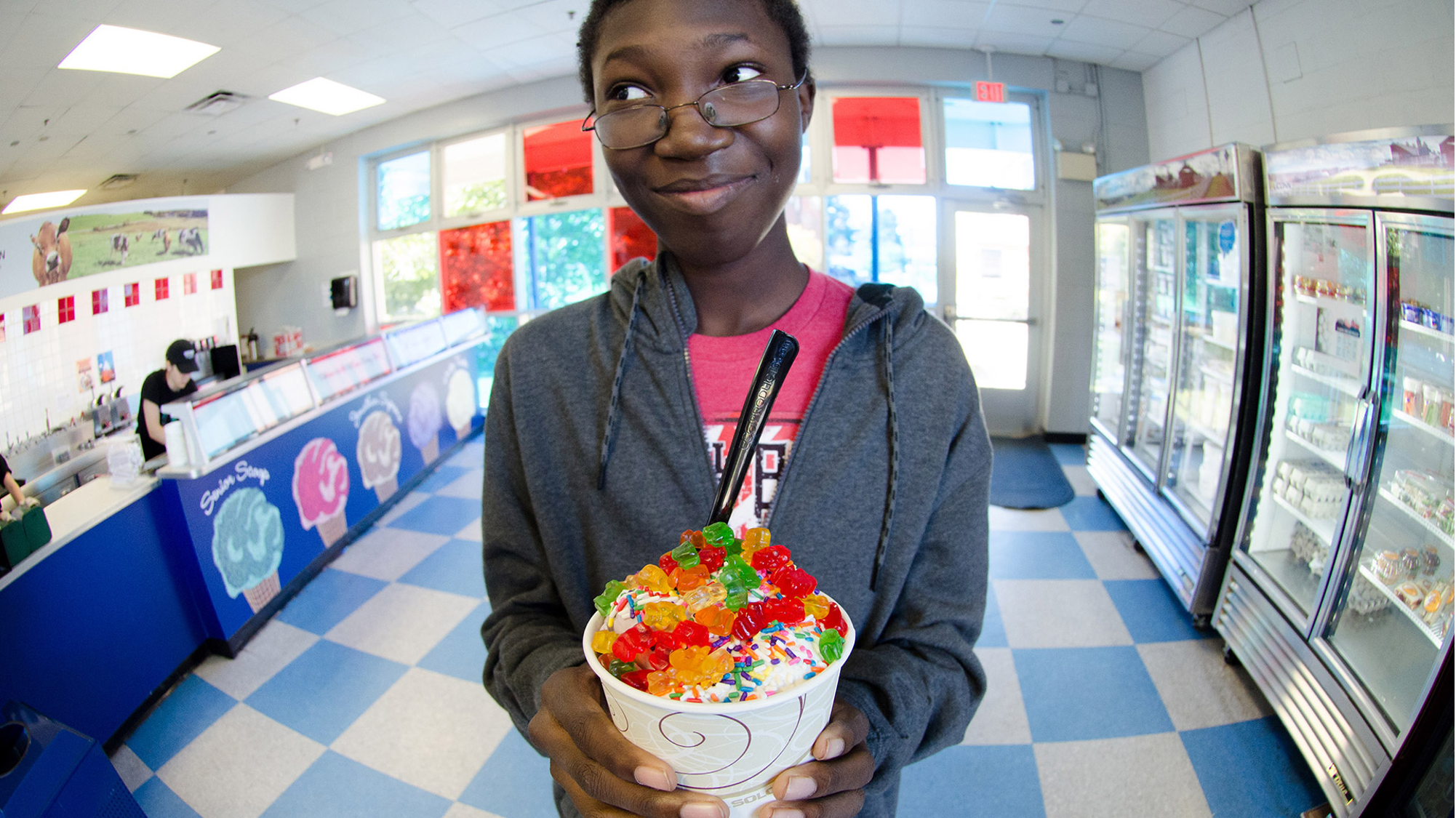 student enjoys Dairy Bar Icecream